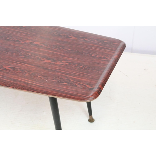 742 - Mid century coffee table, with red and black top, on black tapering legs and metal feet, 40cm high x... 