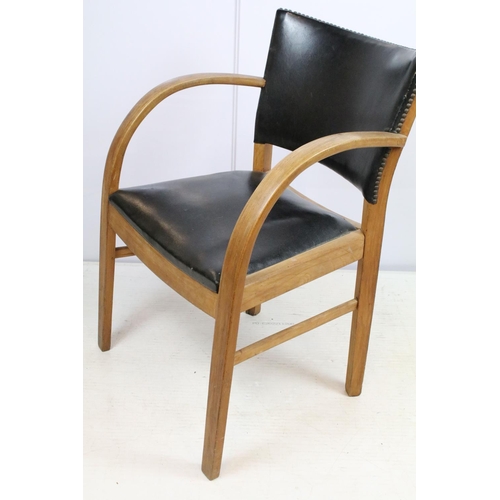 663 - Mid century chair with curved open arms, the back with studded black leatherette panel and black lea... 