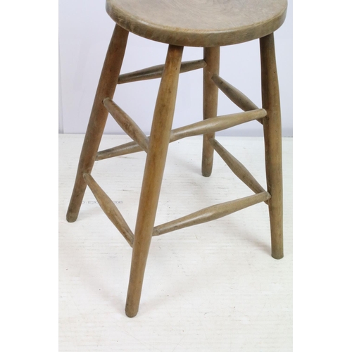 666 - 19th century tall stool with oval one piece elm seat, 60cm high x 43cm wide