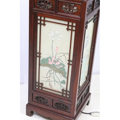 672 - Chinese hardwood carved decorative light, with four glass panels each with painted paper scene, 72cm... 