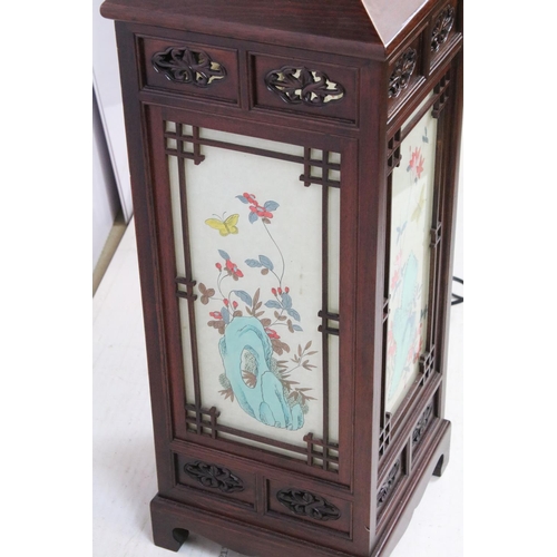 672 - Chinese hardwood carved decorative light, with four glass panels each with painted paper scene, 72cm... 