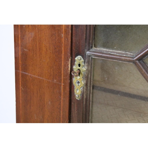 678 - Early 20th century mahogany inlaid display cabinet, with dentil moulded cornice above an astragal gl... 