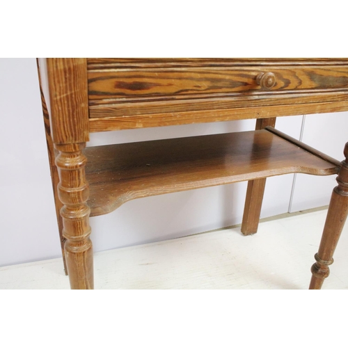 688 - 20th century pine washstand, the marble top with shelf above, with one drawer above turned legs and ... 