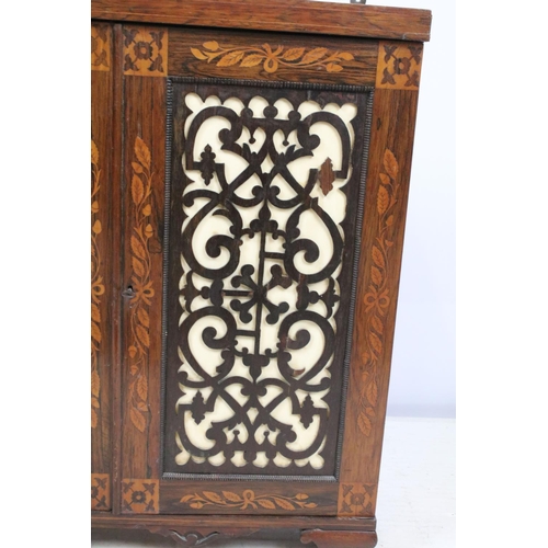 715 - Victorian rosewood two door cupboard of small proportions, with inlaid decoration featuring leaves a... 