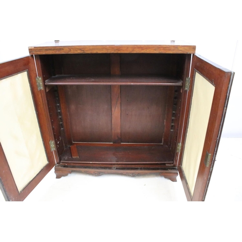 715 - Victorian rosewood two door cupboard of small proportions, with inlaid decoration featuring leaves a... 