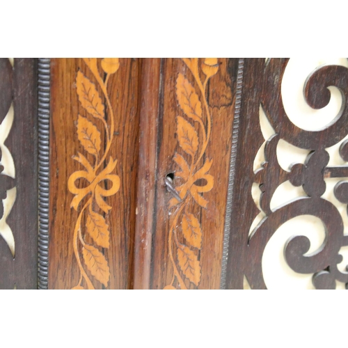 715 - Victorian rosewood two door cupboard of small proportions, with inlaid decoration featuring leaves a... 