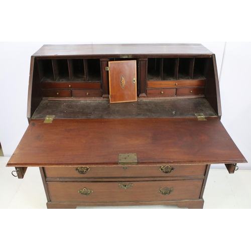 722 - George III mahogany bureau, the fall front opening to reveal an arrangement of cubby holes and drawe... 