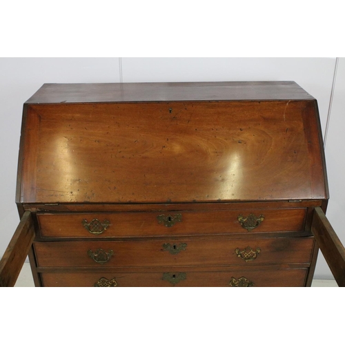 722 - George III mahogany bureau, the fall front opening to reveal an arrangement of cubby holes and drawe... 