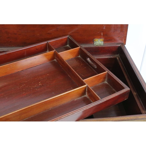 726 - Early 20th century mahogany table, the lid lifts to reveal a butler's lift out tray and storage belo... 