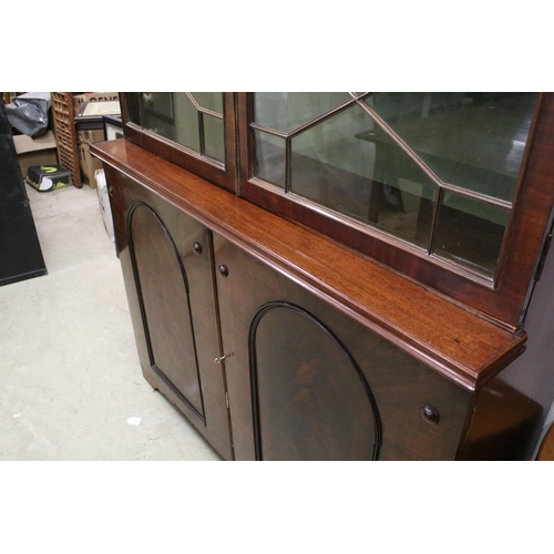 729 - Early 20th century mahogany breakfront bookcase, the upper section with dentil moulding above astrag... 