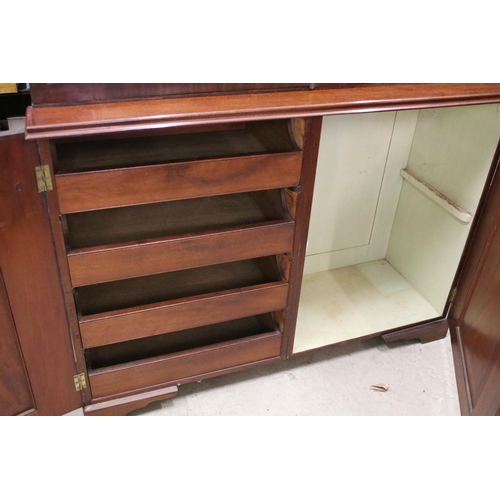 729 - Early 20th century mahogany breakfront bookcase, the upper section with dentil moulding above astrag... 