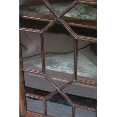 731 - Edwardian mahogany inlaid corner display cabinet, with astragal glazed door and three fitted shelves... 