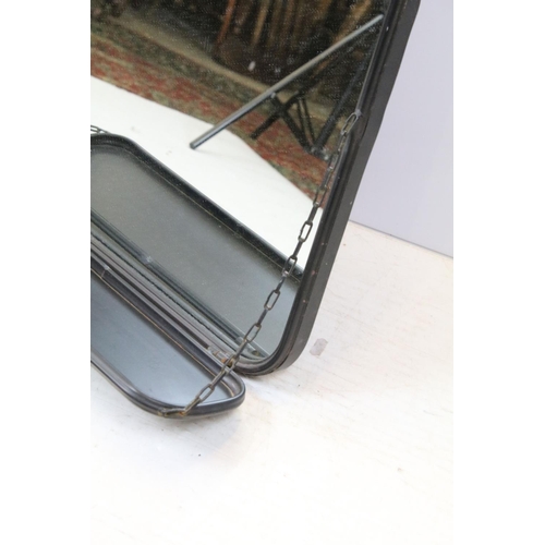 739 - Black metal framed wall mirror, with shelf suspended by chains, 70cm high x 49.5cm wide x 18cm deep