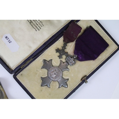 293 - A selection of R.A.O.B. medals / jewels to include silver example together with a full size M.B.E. m... 