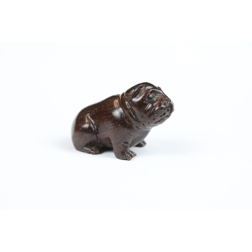 294 - Three Chinese carved wooden netsuke in the form of a Monkey, dog and cockerel.