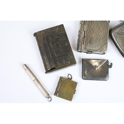 296 - Silver vesta case, Chester 1919, a silver propelling drill, a Tiffany sterling olive fork, a WNF sil... 