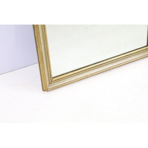 734 - Gilt framed rectangular mirror, label verso for Ernest Muddiman, Buckingham Palace Road, London, SW1... 