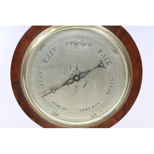 736 - Late Victorian carved rosewood barometer, with thermometer, inscribed G Kegele, London, 102cm high