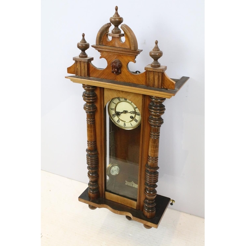 737 - Chas L Reis, Glasgow, carved mahogany and oak wall clock, with maker's plaque, 100cm high