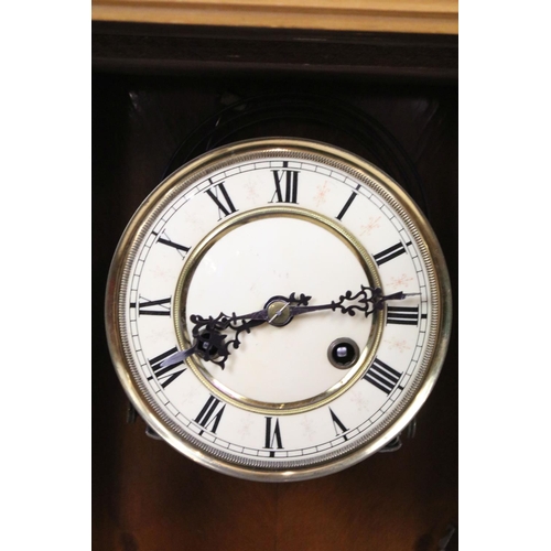 737 - Chas L Reis, Glasgow, carved mahogany and oak wall clock, with maker's plaque, 100cm high