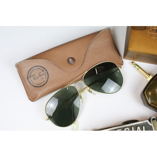 306 - A small group of mixed collectables to include a cased pair of vintage Ray Ban aviators together wit... 