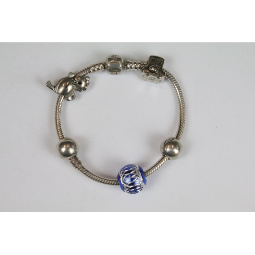 314 - A boxed Pandora charm bracelet with charms together with a ladies Accurist watch.