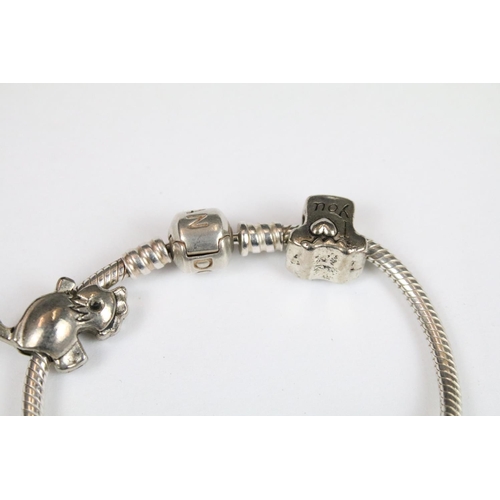 314 - A boxed Pandora charm bracelet with charms together with a ladies Accurist watch.