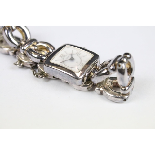 314 - A boxed Pandora charm bracelet with charms together with a ladies Accurist watch.