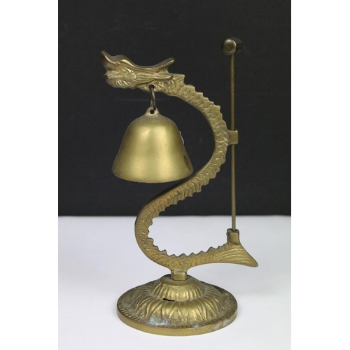 317 - A collection of three brass Chinese ornaments to include figures and a table bell together with an i... 