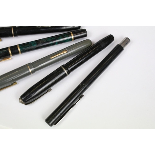 319 - A small collection of mixed pens and fountain pens to include Parker and Waterman examples including... 