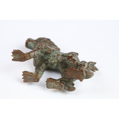 332 - A Chinese bronze ornamental lion in the traditional form