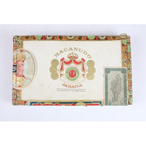 335 - A sealed wooden box of Macanudo Jamaican cigars.