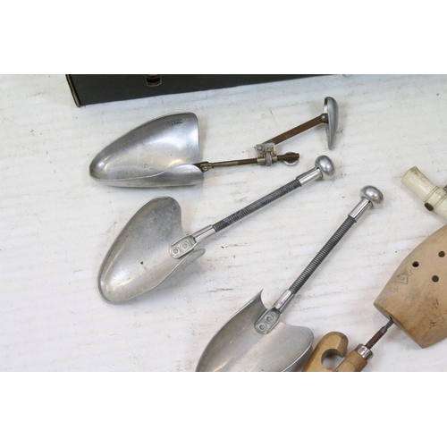 502 - Pair of wooden shoe lasts, aluminium shoe lasts, boot pulls and riding spurs