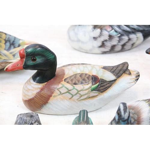 503 - Collection of painted wooden ducks / waterbirds, a Welsh slate bird and a 'Rocking Roosters by Galla... 