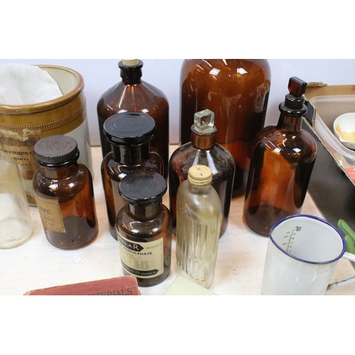 508 - Collection of apothecary / medical related items to include glass bottles, jars, books, first aids s... 