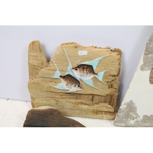 514 - Five oil paintings of fish on wood, to include a painting of a trout on driftwood (driftwood approx ... 