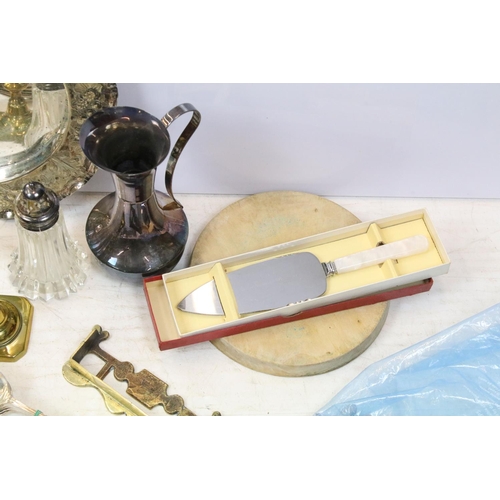 515 - Mixed metal ware to include two pairs of brass candlesticks, silver plated tray with embossed, decor... 