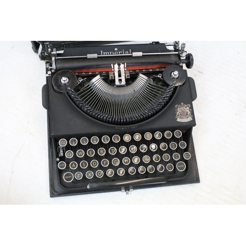 517 - Two cased Imperial typewriters