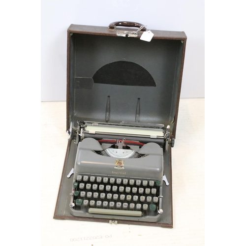 517 - Two cased Imperial typewriters