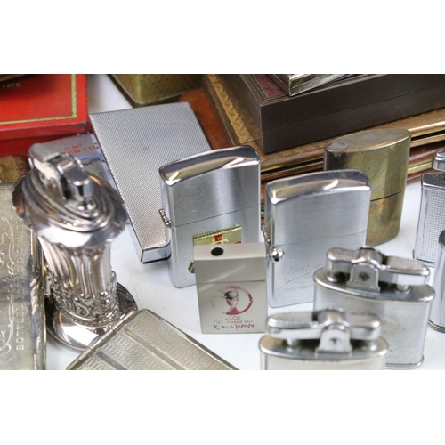 344 - Mixed collectables to include a silver toast rack, lighters (featuring Ronson), cigarette cases / bo... 