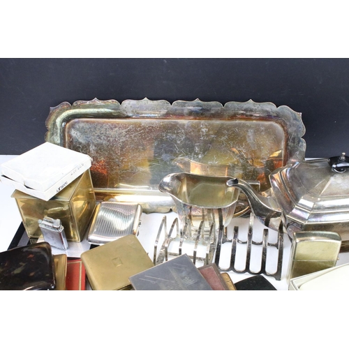 344 - Mixed collectables to include a silver toast rack, lighters (featuring Ronson), cigarette cases / bo... 