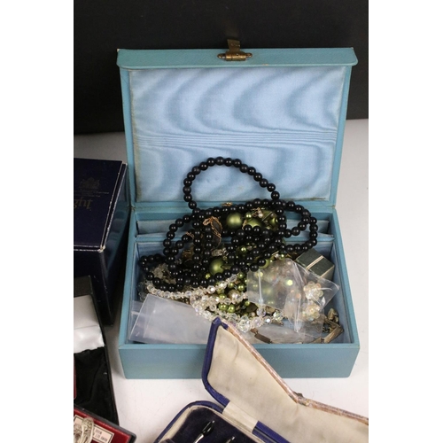 349 - A box of mixed collectables to include three hallmarked silver fob medals, costume jewellery, powder... 