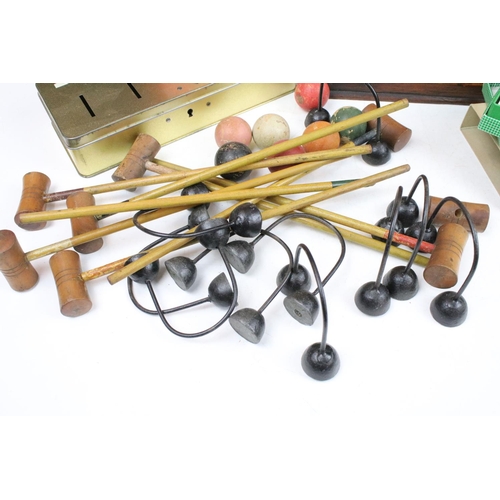 361 - A group of vintage toys and games to include draughts, dominoes and a table top croquet set.