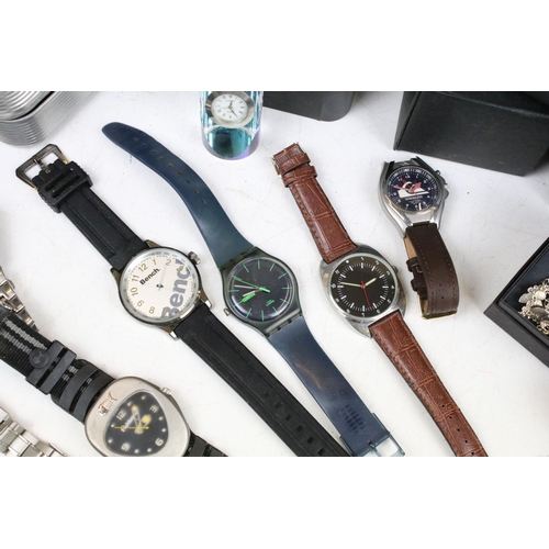 362 - A large collection of mainly contemporary ladies and gents wristwatches.