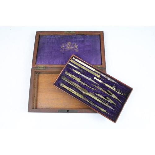 379 - A vintage wooden cased drawing set to include compasses etc..