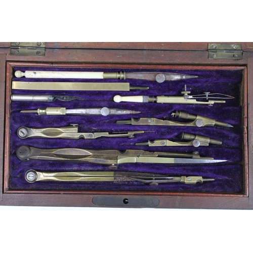 379 - A vintage wooden cased drawing set to include compasses etc..