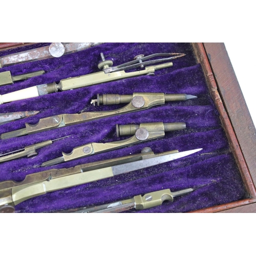 379 - A vintage wooden cased drawing set to include compasses etc..