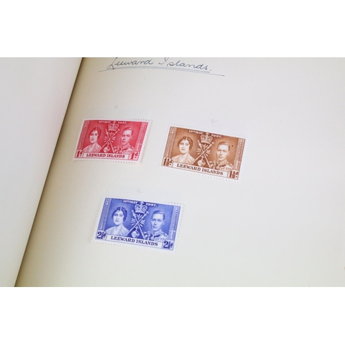 523 - A stamp album containing stamps marking the silver jubilee of King George V from the UK and Commonwe... 