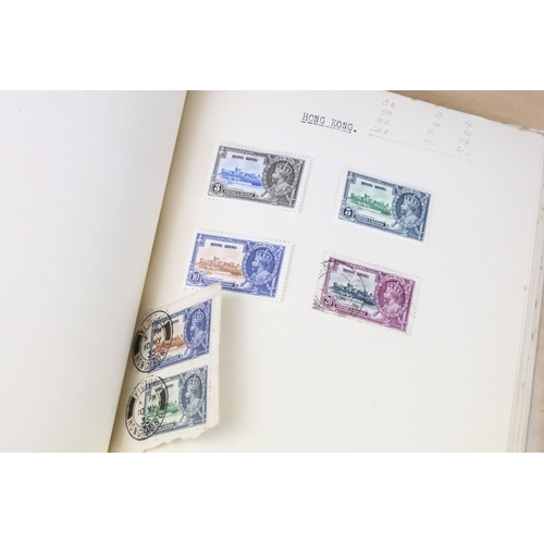 523 - A stamp album containing stamps marking the silver jubilee of King George V from the UK and Commonwe... 