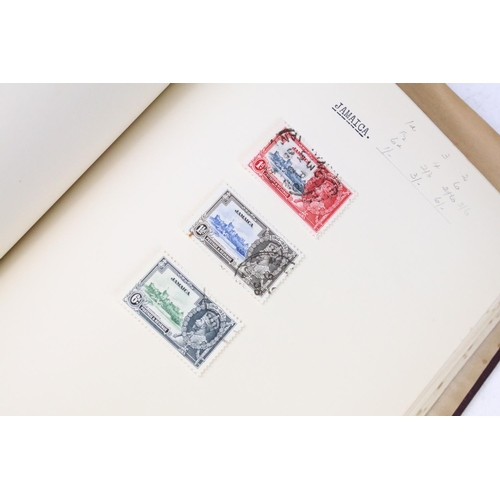 523 - A stamp album containing stamps marking the silver jubilee of King George V from the UK and Commonwe... 